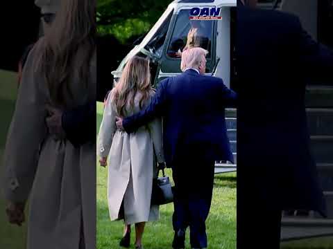 Is love in the air? A tender moment before a solemn journey.