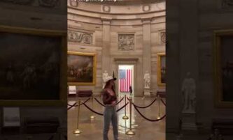 Specialist Madeline Douglas signs Amazing Grace at Capitol Rotunda