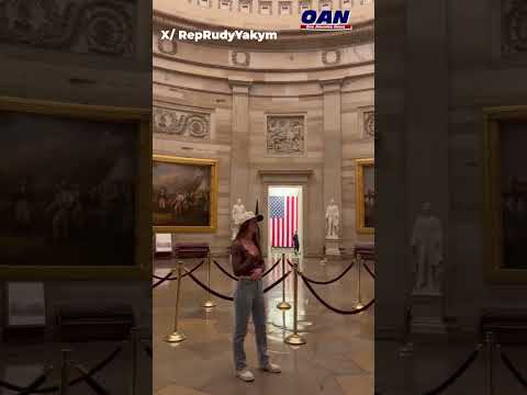 Specialist Madeline Douglas signs Amazing Grace at Capitol Rotunda