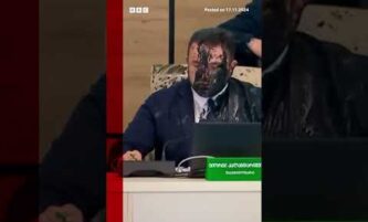 Moment Georgia election chief doused in paint by opposition official. #Georgia #BBCNews