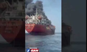 Video showed thick black smoke rising from a vessel at sea